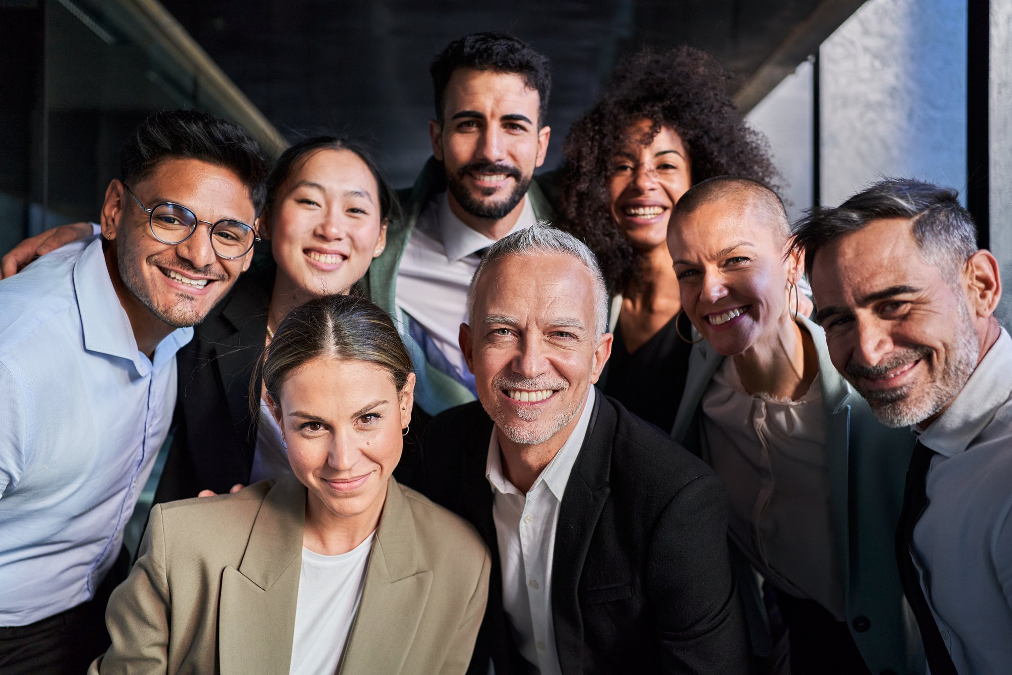 cheerful-portrait-of-group-of-businesspeople-takin-2024-12-08-01-10-25-utc-1
