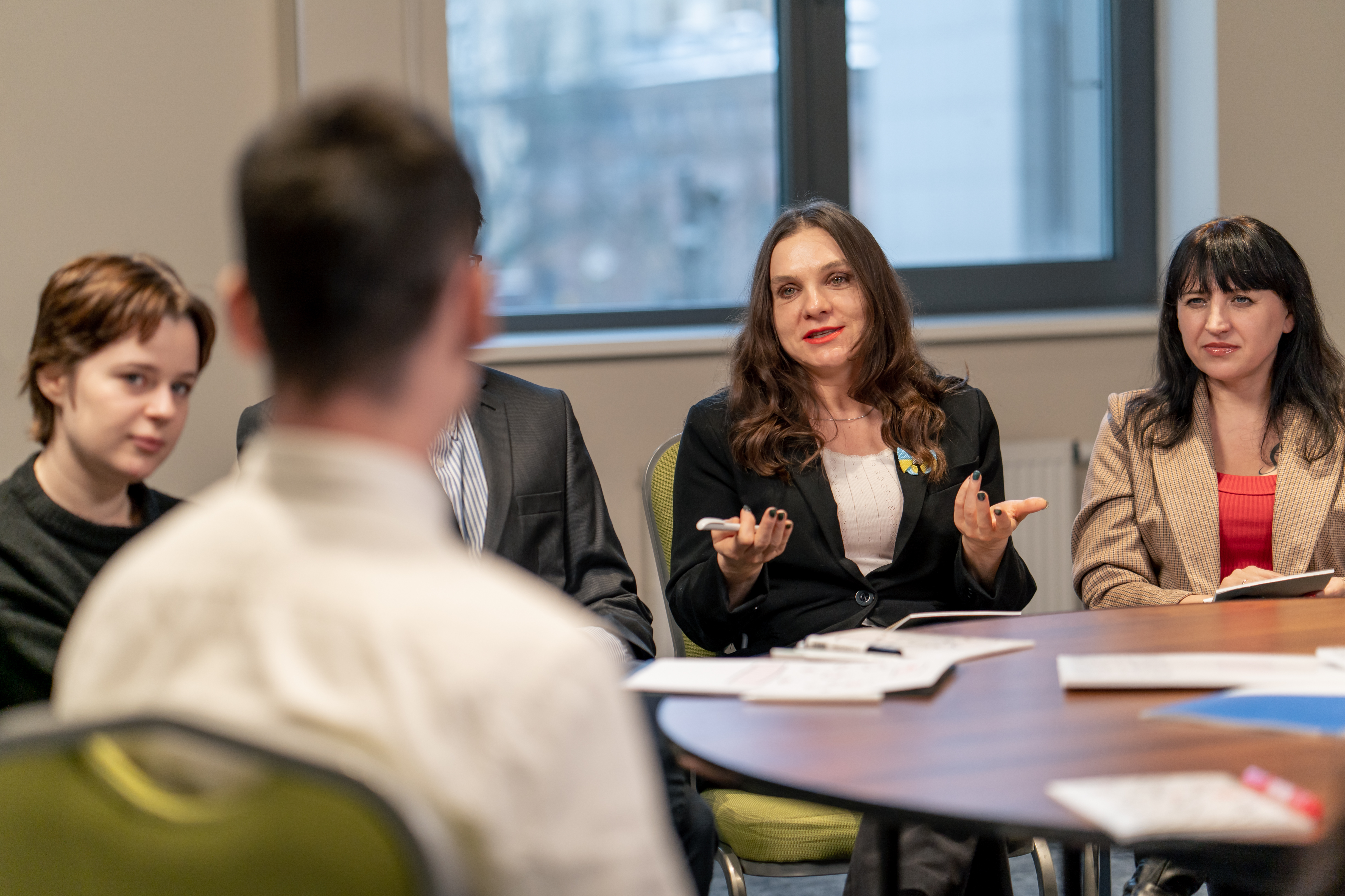 business-meeting-the-audience-asks-a-question-or-o-2024-12-02-11-43-48-utc